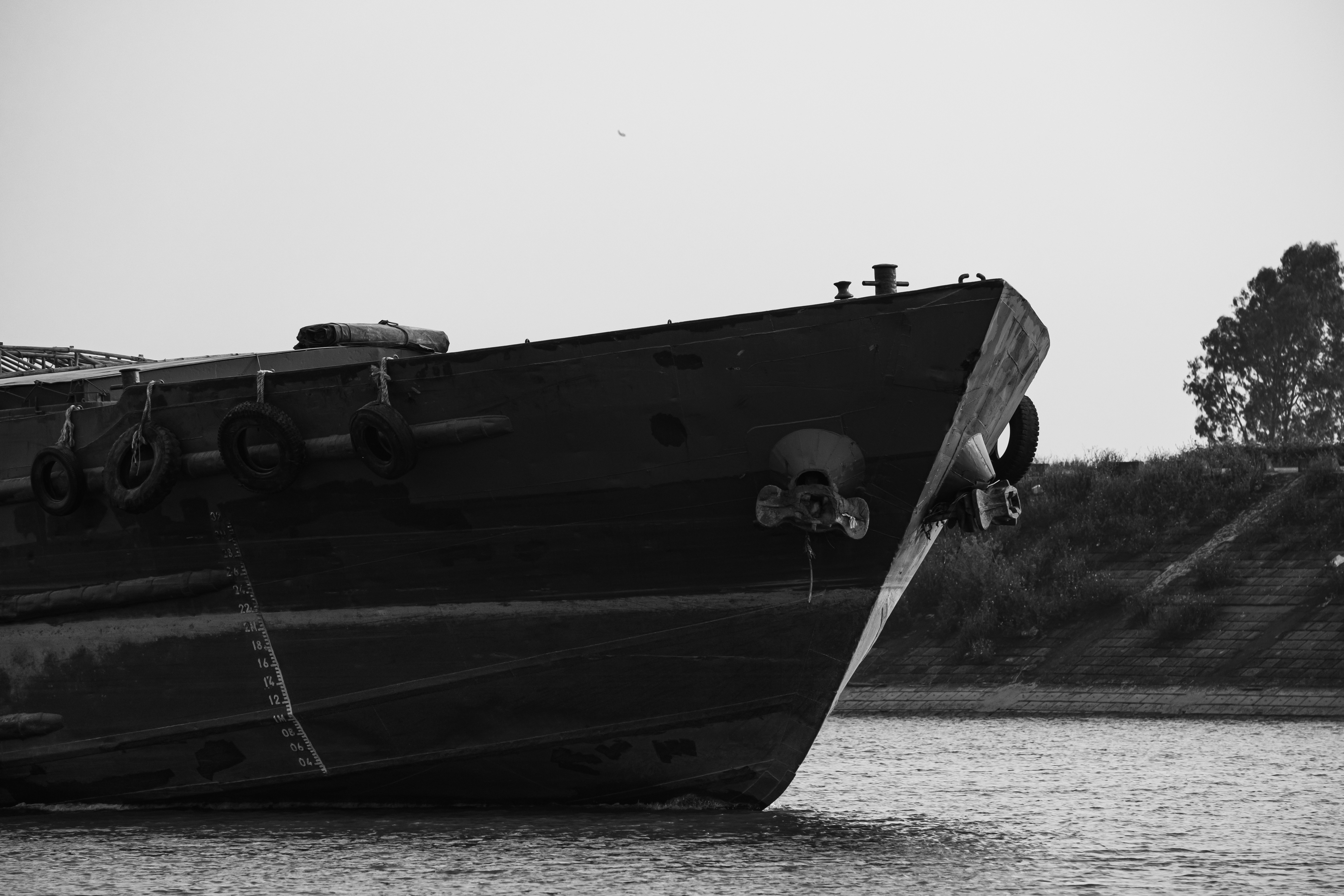 Vessel bow detail — close-up of hull and fenders