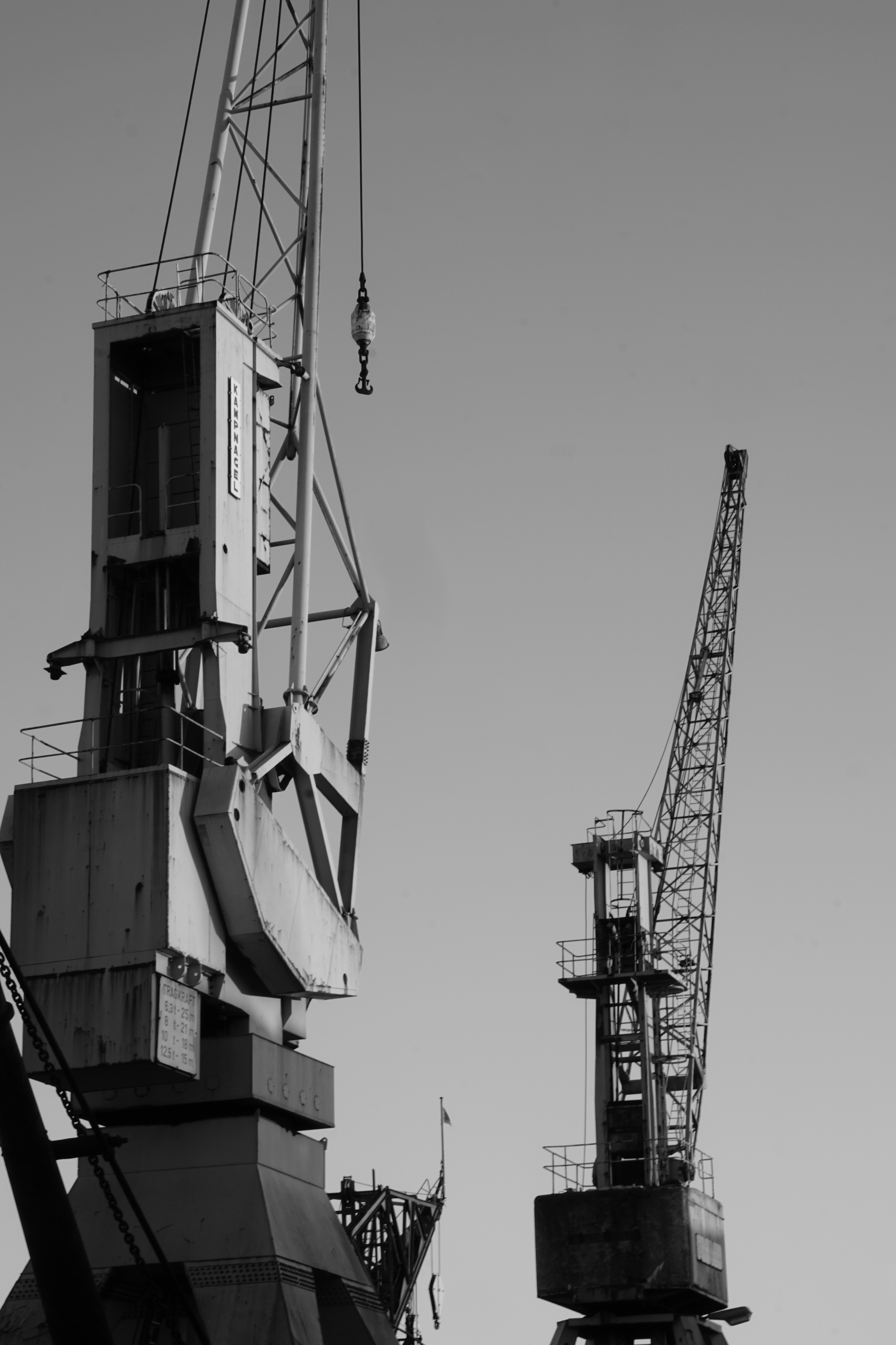 Shipyard cranes against open sky